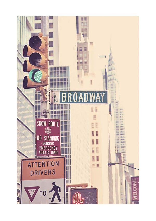 Poster featuring a Broadway street sign with traffic lights and city buildings in the background.