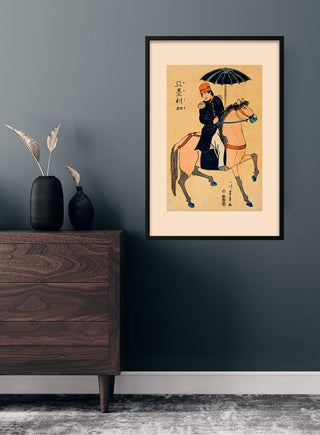 Framed Amerika by Utagawa Yoshikazu japansk kunstposter hanging on a dark wall above a wooden dresser.