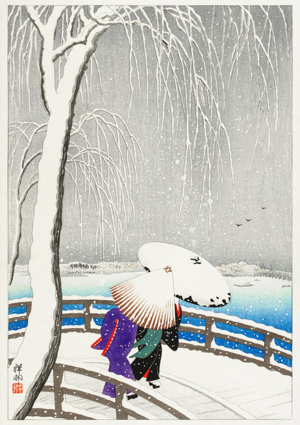 Two women with umbrellas walk on a snow-covered bridge by the water, surrounded by bare winter trees.