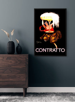 Contratto Vintage Plakat on a dark wall above a wooden dresser with decorative vases and dried plants.