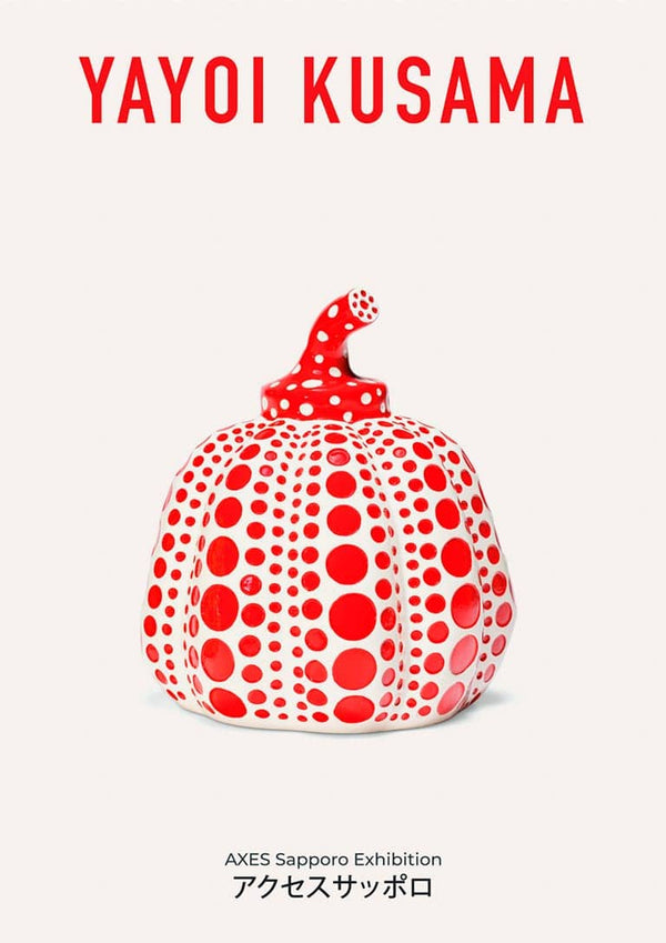 Red pumpkin sculpture with white and red polka dots by Yayoi Kusama on a white background.