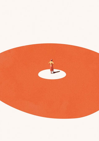A person in orange stands confidently at the center of a white circle within a large red area.