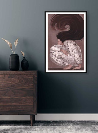 Framed "My Hair is Love - Kate Aitana" poster on a dark wall above a wooden dresser with minimalist decor.