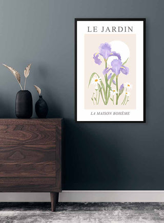 Framed "Le Jardin no. 2" art print featuring purple irises, styled above a modern wooden dresser.