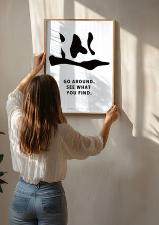 Cycle by KOUYOU KITAZUMI being hung on a sunlit wall