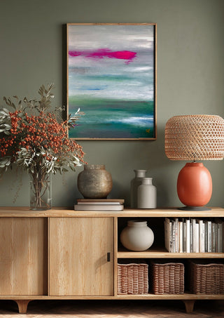 Scarlet sunset 2 by Marina Agre above a wooden sideboard on a sage green wall