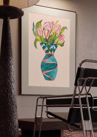 Baby tulips by Marjorie Salvagni framed in a dim room beside a tubular steel chair