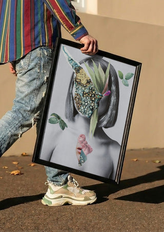 The color of fresh roses by Rocio Montoya carried in a black frame along a sunny street