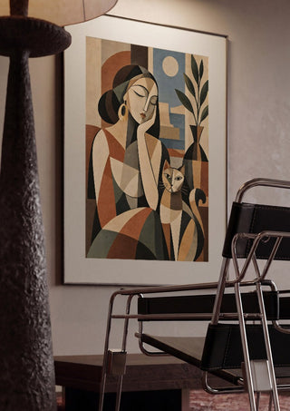 Geometric Woman & Cat – Earthy Cubist Harmony by TimlessArtworks framed in a dim room beside a tubular steel chair