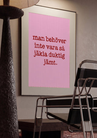 Duktig jämt by Grafik bageri framed in a dim room beside a tubular steel chair