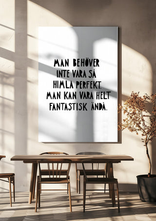 Fantastisk by Grafik bageri hanging above a wooden dining table in warm sunlight