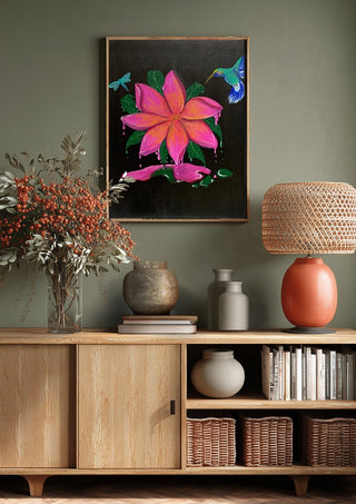 Flora e Fauna by KG Studio above a wooden sideboard on a sage green wall