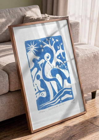 Schnitt durch den Hain · Cut Through the Grove by ELIZA Leopold in a walnut frame leaning against a grey sofa
