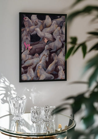 One with Nature by Daukantė in a black frame above a glass table with crystal glassware