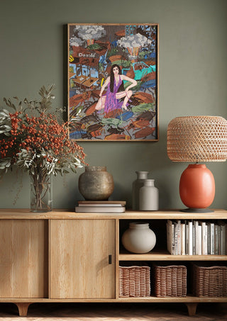 The only things that will be left after a nuclear holocaust are cockroaches and Cher by Daukantė above a wooden sideboard on a sage green wall
