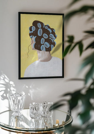 Different solution by Jaron Su in a black frame above a glass table with crystal glassware