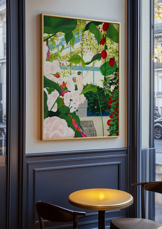 Artist paints in naked workshop by Jaron Su in an oak frame on a panelled café wall
