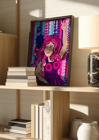 Octopus dancing queen by ALEX in a dark frame on a wooden shelf beside books and a lamp