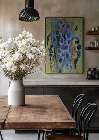 Summer rain by Alice Ruja in a black frame above a rustic table with white flowers