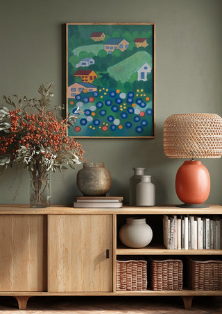 View from above by Gerard Ceulemans above a wooden sideboard on a sage green wall