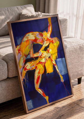Two Figures in Blue by René J in a walnut frame leaning against a grey sofa