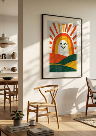 Sunrise Arch by Decker Studios in a black frame in a bright dining room with wooden chairs