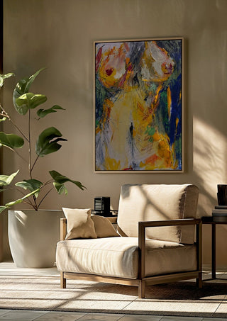 Torso in Yellow by René J framed above a beige armchair beside a potted plant