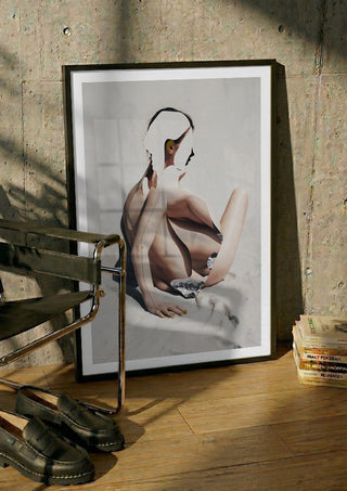 Over the void by Rocio Montoya in a black frame leaning against a concrete wall by a steel chair