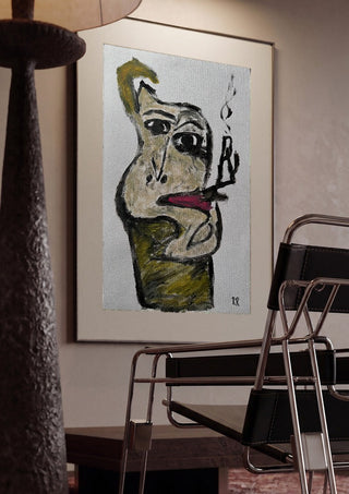 Pipan by RR framed in a dim room beside a tubular steel chair