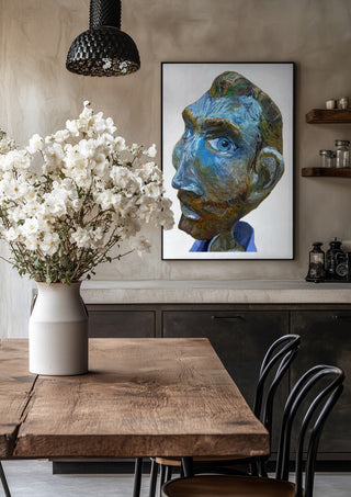 Vincent by Simone Hübner-Schwinn in a black frame above a rustic table with white flowers