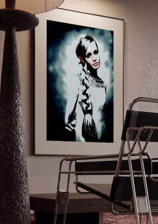 Twiggy by Pelecan Schneider framed in a dim room beside a tubular steel chair