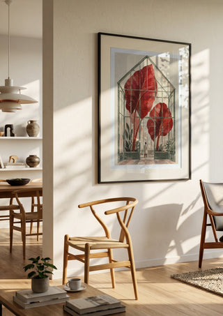 The Red Conservatory by Matthews Gallerie in a black frame in a bright dining room with wooden chairs