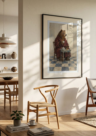 Tea Before Noon by Matthews Gallerie in a black frame in a bright dining room with wooden chairs