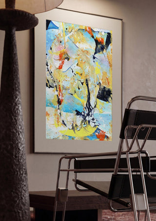Composition Yellow on Blue by Andreas Pohle framed in a dim room beside a tubular steel chair