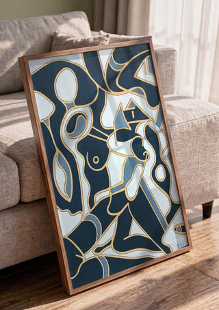 Erotica by Andreas Pohle in a walnut frame leaning against a grey sofa
