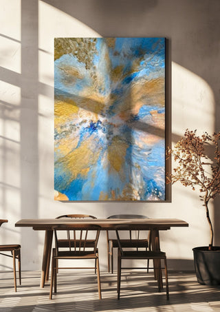 Sand and Sky by Da Winters hanging above a wooden dining table in warm sunlight