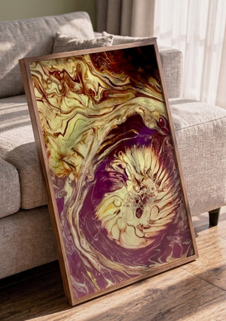 Plum Bloom by Da Winters in a walnut frame leaning against a grey sofa