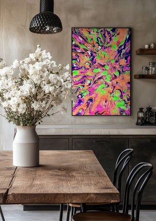 Neon Bloom by Da Winters in a black frame above a rustic table with white flowers