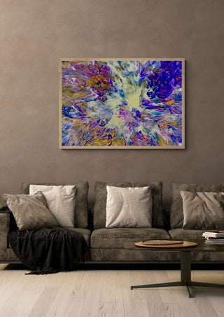 Violet Spark by Da Winters in a light wood frame above a grey sofa with cushions