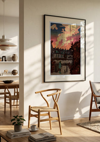 Evening walk by Nina Broen in a black frame in a bright dining room with wooden chairs