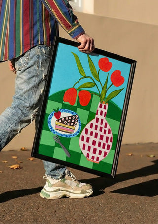 Sweet Afternoon by LGDyrby carried in a black frame along a sunny street