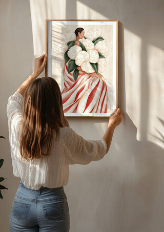 White Peonies by Martina Karlsson being hung on a sunlit wall