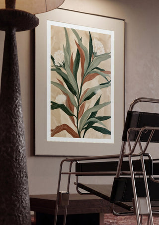 Sage and Rust by Martina Karlsson framed in a dim room beside a tubular steel chair