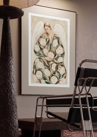 Peony Angel by Martina Karlsson framed in a dim room beside a tubular steel chair
