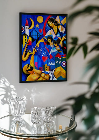 The Divine Touch by Andreas Gerlach in a black frame above a glass table with crystal glassware