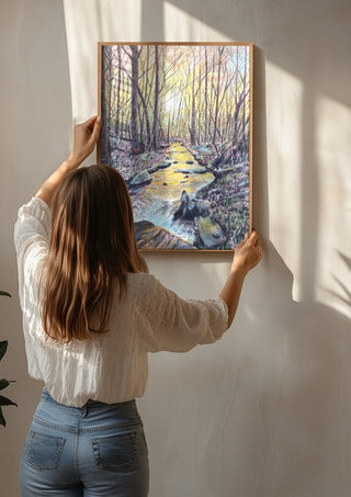 The Evening Stream by Finbar Stevens being hung on a sunlit wall