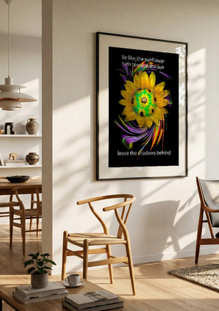 Be like the sunflower by Walter Zettl in a black frame in a bright dining room with wooden chairs