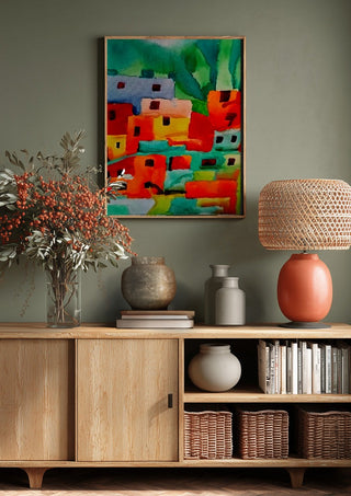 Houses of Favela by Nittaart above a wooden sideboard on a sage green wall