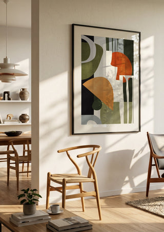 Abstract Art 42 by ThingDesign in a black frame in a bright dining room with wooden chairs