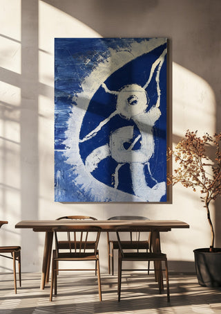 Fragility by Linor Citaku hanging above a wooden dining table in warm sunlight
